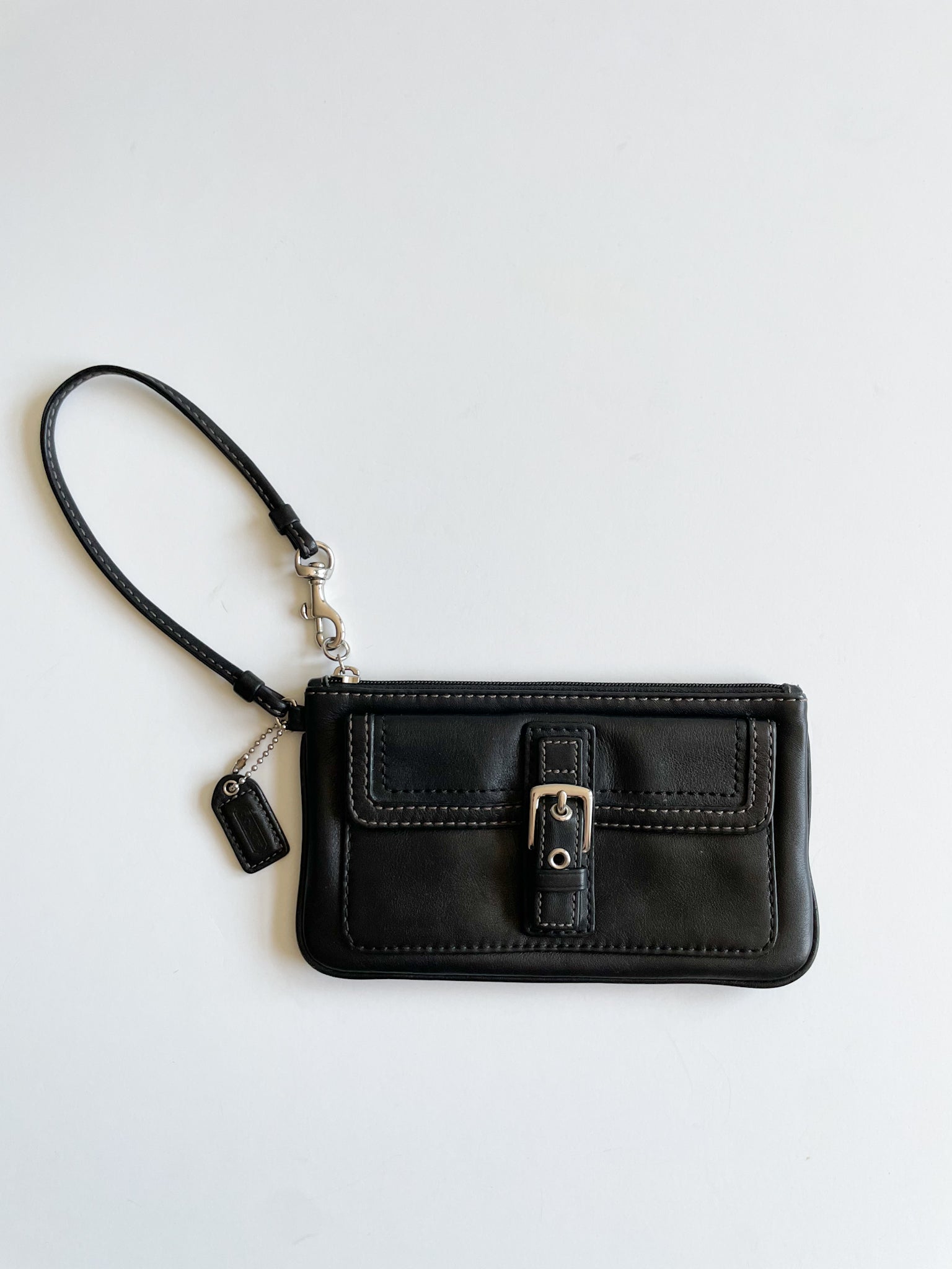 Coach Park Leather Small Wristlet Black NWT This Coach wristlet features a  zipper pocket that also functions as a wristlet strap. …
