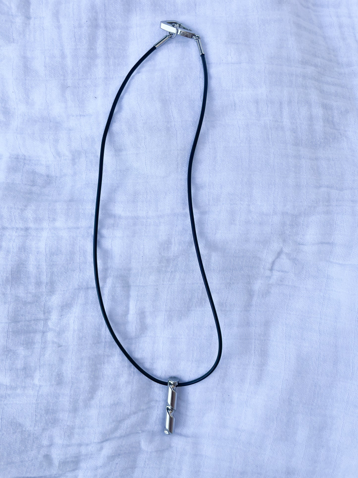 BK-UP BY BARAKA Black Plastic Cord Stainless Steel Twist Necklace